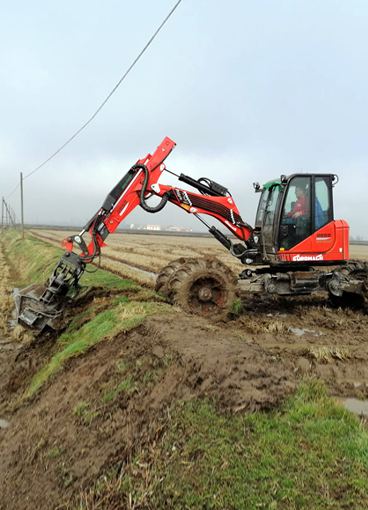 Excavator with forestry grapple